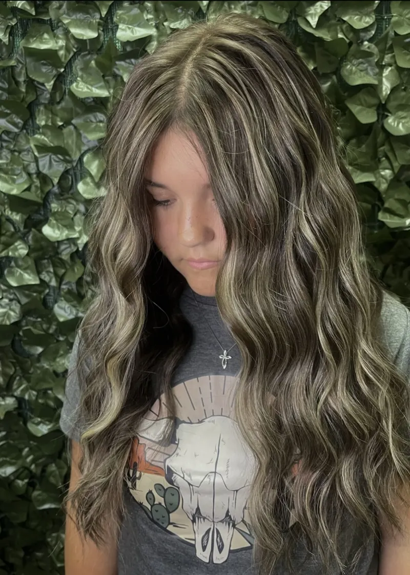 beach waves with blended highlights for a natural ponchatoula look in cosmetology