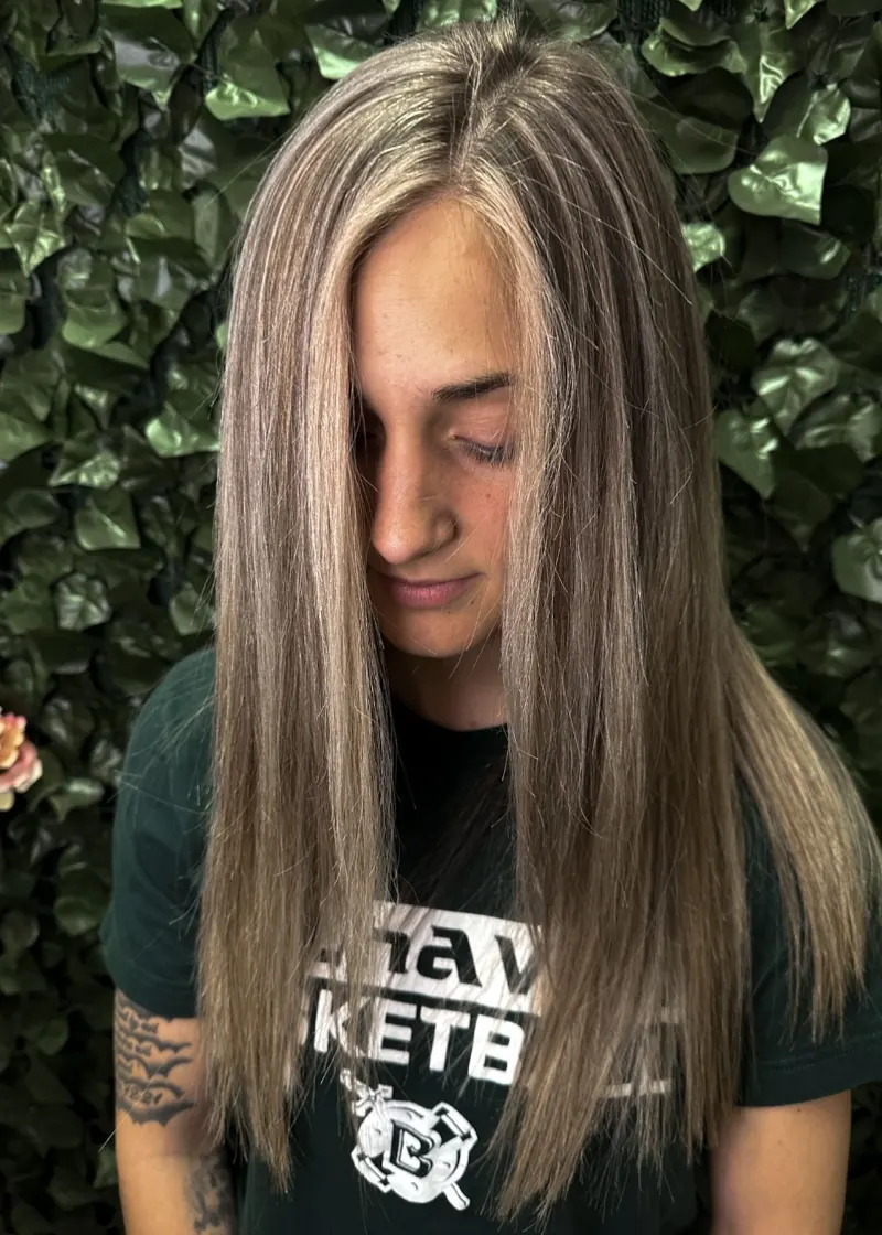 sleek ash blonde straight hair with subtle highlights framing the face vibrant and stylish perfect for ponchatoula's trendsetting scene